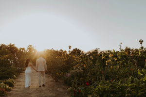 bride and groom walking at Flora Farms wedding