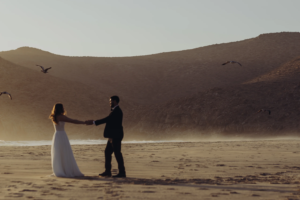 Bride and groom dancing at Todos Santos Beach