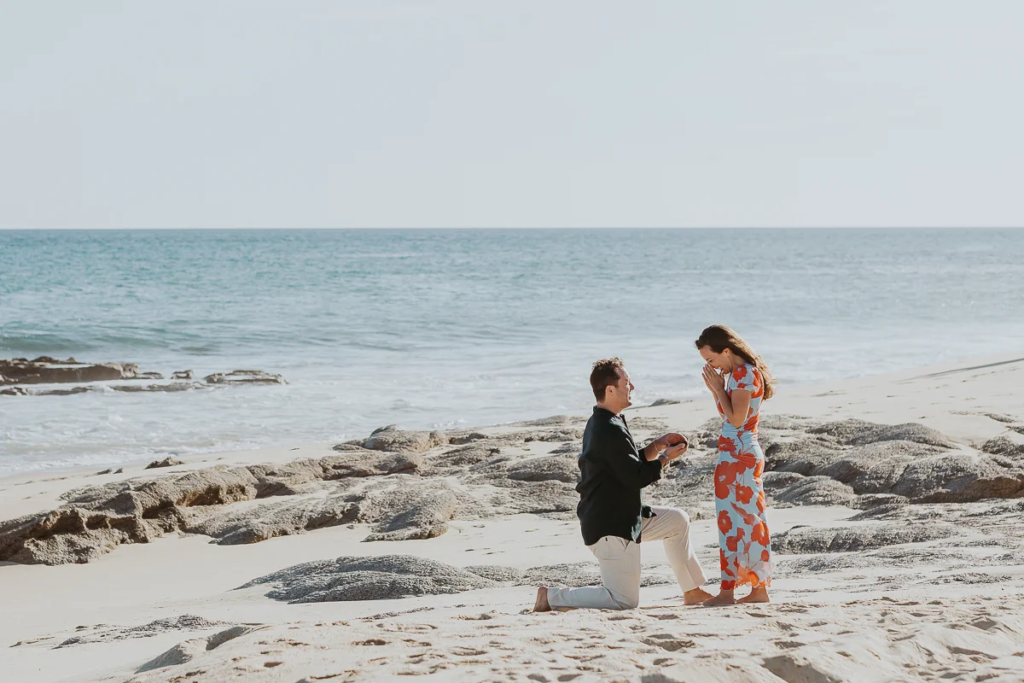 man proposes to girlfriend at Cabo San Lucas Beach