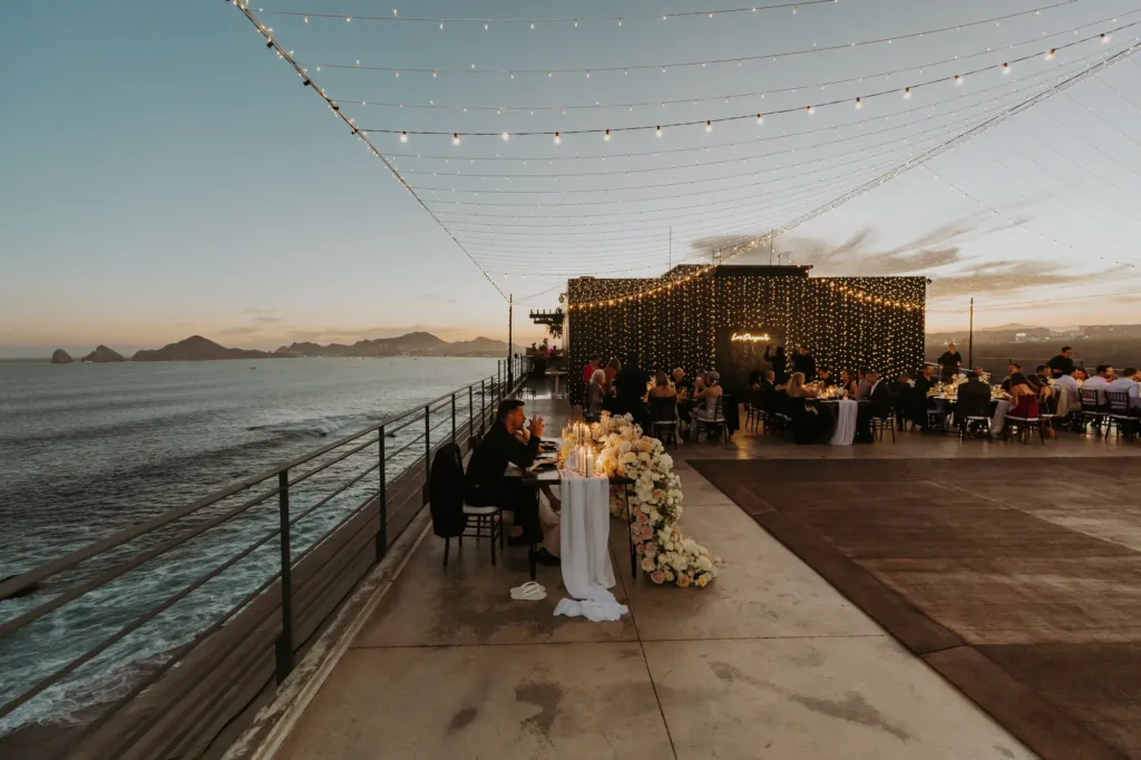 Wedding reception at sunset with Los Cabos ocean in the background