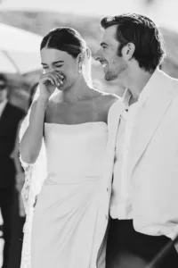 Bride laughing during ceremony
