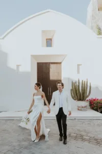 Bride and groom exit the wedding chapel at San Cristobal Hotel
