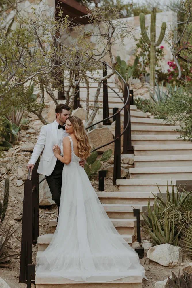 Groom kisses bride