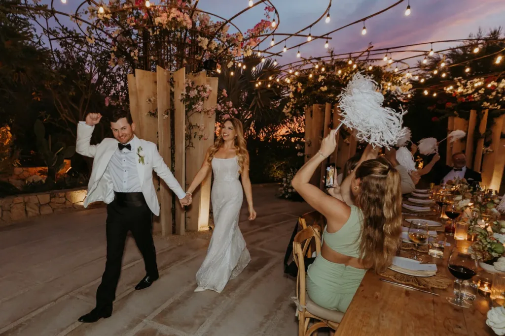 grand entrance by the bride and groom to the reception