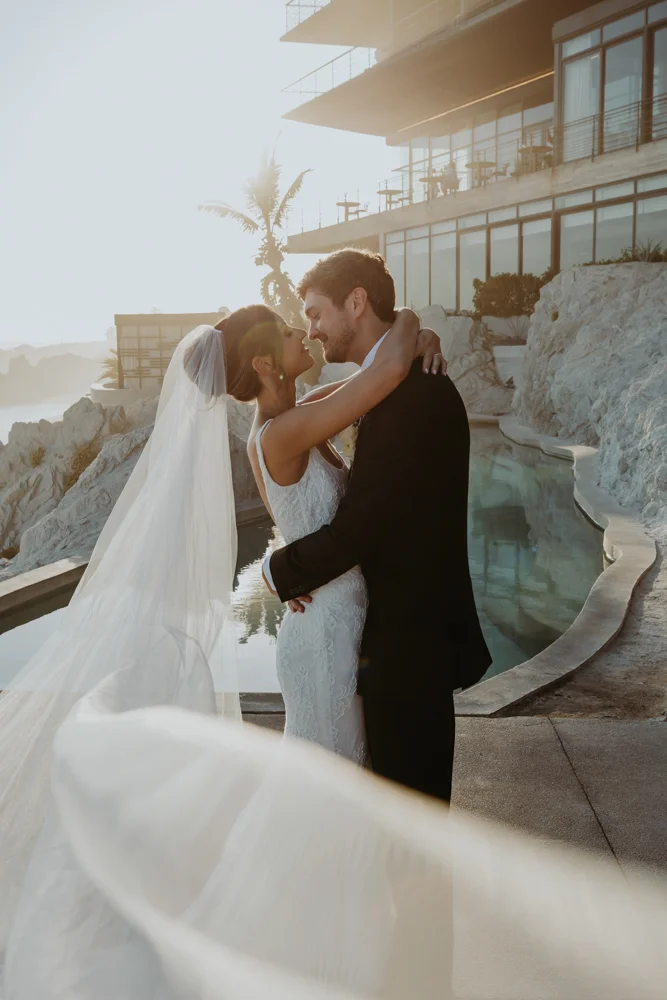 The Cape hotel wedding Bride and groom kissing at The Cape Los Cabos