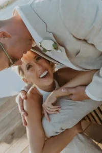 Bride laughing with the groom