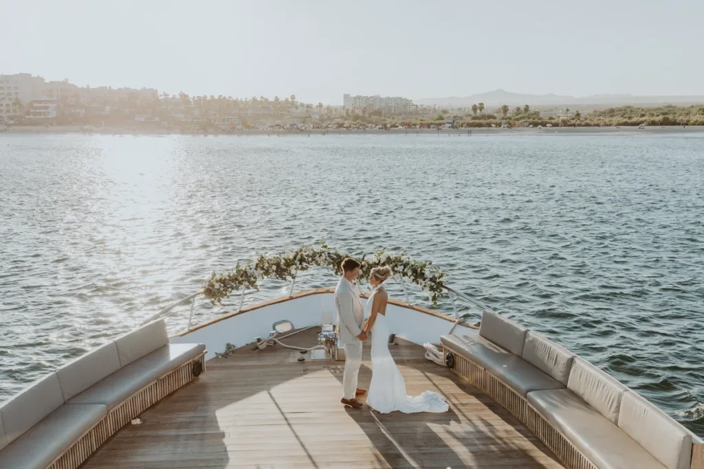 Bride and groom dancing on their yacht wedding